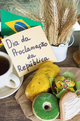 cookies with green and yellow glaze as Brazilian flag colors. cup of coffee and Flag of Brazil, decorative patriotic breakfast - The Proclamation of the Republic text