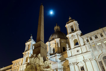 Fototapeta premium The Egyptian obelisk by night, Piazza Navona, Rome, Italy