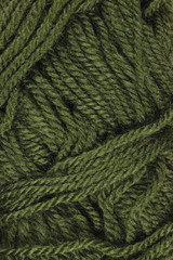Natural green fine wool threads texture, textured clew macro closeup vertical background pattern