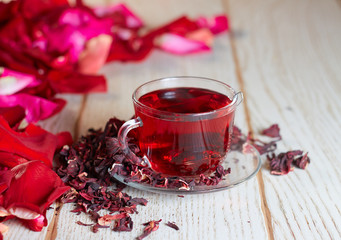 Red Hibiscus tea in glass mug