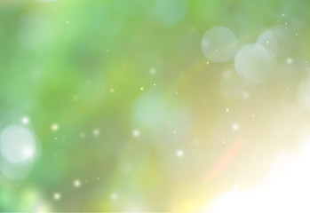 Nature glitter sparkle defocused rays lights bokeh abstract background.