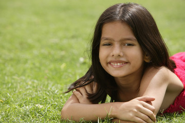 little girl on grass