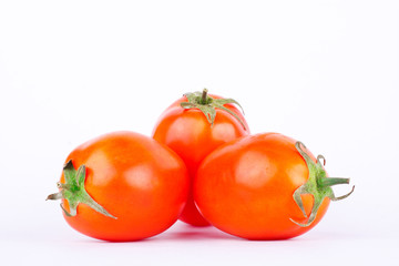Red tomato is high in vitamin C vegetables fruit on the white background isolated
