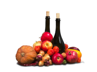 Group of various fruits and vegetables with bottles