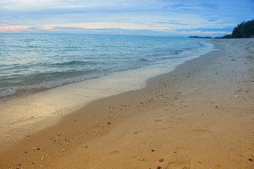 Sea water, beach, and sky. motion of the sea in the morning. 