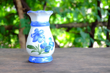 blue vase on nature background.