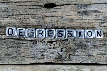 cube word depression on table
