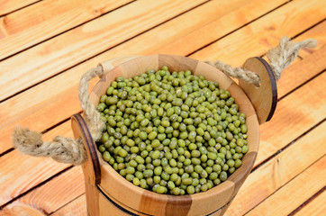 beans mung in bucket on table