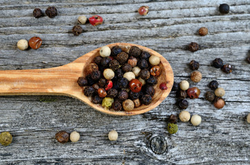 peppercorn in spoon on table