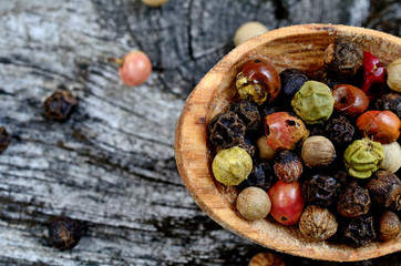 peppercorn in spoon on table