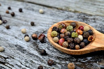 peppercorn in spoon on table