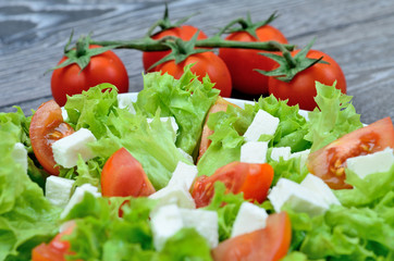 salad and tomatos on table