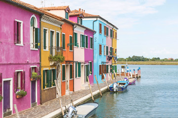 Fototapeta na wymiar Colorful houses on the island of Burano (Venice, Italy). All potential trademarks are removed.