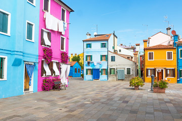 Fototapeta na wymiar Picturesque square with its colorful houses on the island of Burano (Venice, Italy)