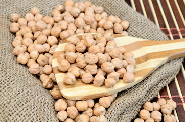 chickpea in spoon on table