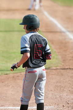 American teen baseball player batting