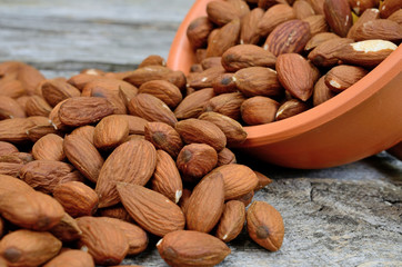 almond in bowl flow on table