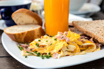 omelet with ham tomato and orange juice