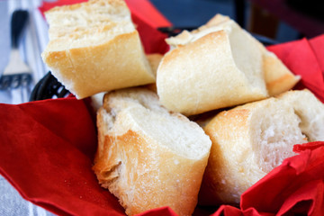 bread in basket - little roll breads in basket on table
