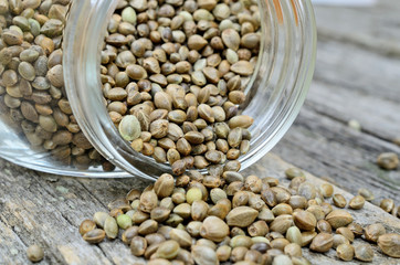 hemp seed in jar flow on table