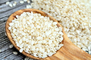 sesame in spoon on table