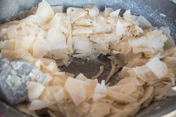 Ma-praao Kaew - crispy sweet coconut candy in a p