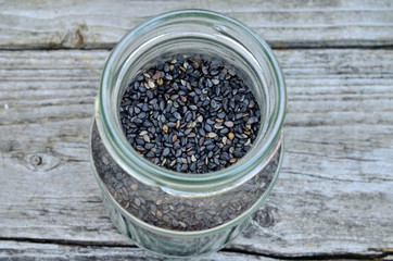 black sesame in jar on table