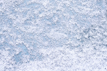 Fototapeta na wymiar Christmas background texture snow light blue background with snowflakes.