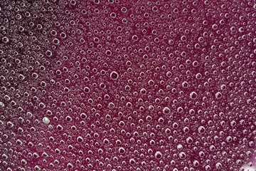 Purple water drops background texture