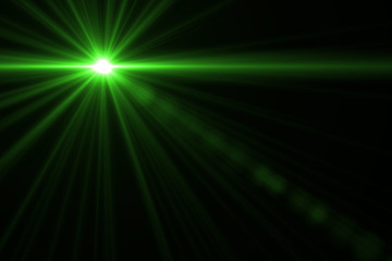 abstract lens flare green  light over black background