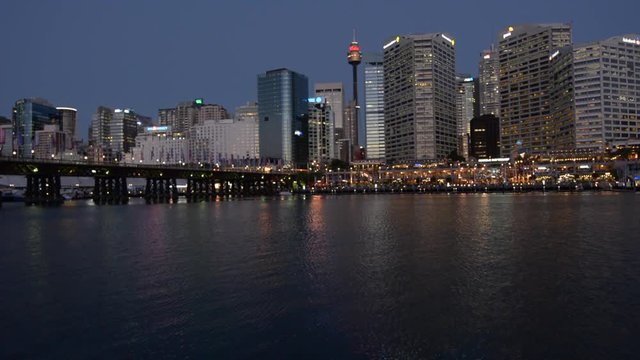 Cityscape of Darling Harbour at night, a recreational and pedestrian precinct situated on western outskirts of the Sydney central business district in New South Wales, Australia.