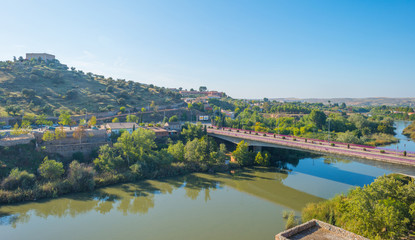 Fototapeta na wymiar Modern bridge over a river in Toledo