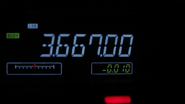 A white number as tuner on a radio. The frequency tuner to have the station on a radio