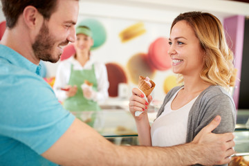 Obraz na płótnie Canvas Happy woman enjoy in ice cream in confectionery