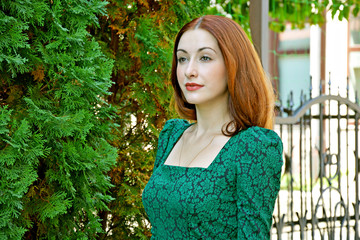 Woman in vintage green dress