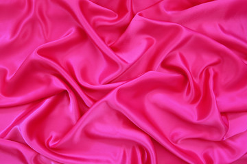 blue silk or blue satin textile fabric texture background