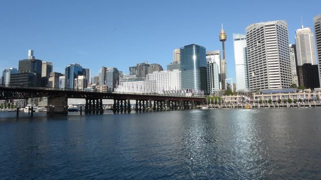 Cityscape of Darling Harbour at sunset, a recreational and pedestrian precinct situated on western outskirts of the Sydney central business district in New South Wales, Australia.