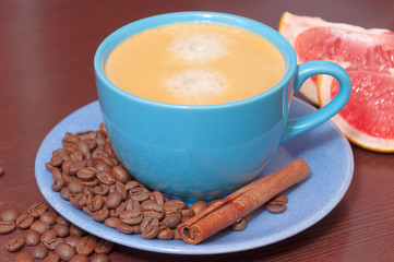 Coffee cup with crema. Capuccino or espresso in blue mug.