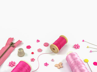 Fototapeta na wymiar Pink embroidery set over white background
