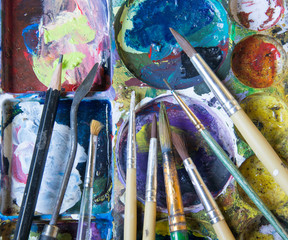 Obraz premium Painter's palette filled with many colors. Following completion