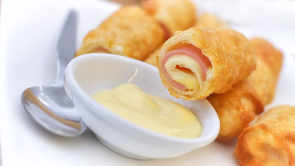 Ham cheese spring rolls for party and breaks, fusion food concept and homemade idea
