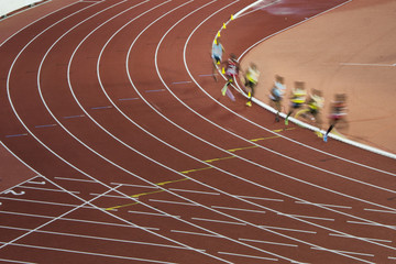 Athletes on the track in motion. Professional race was preparation on olympic game