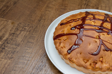 Homemade pie on rustic background