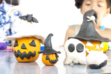 Boy and girl are happily playing clay toy