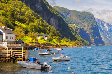 Boats in Undredal with the fjord in the background, Norway