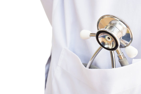 Stethoscope in pocket of doctor white uniform isolated over white background