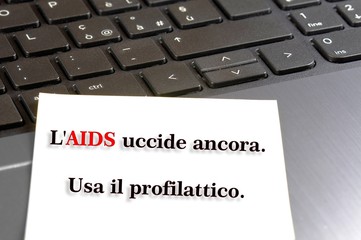 Informazione circa l'uso del profilattico nella prevenzione della diffusione dell' AIDS. Sfondo di...