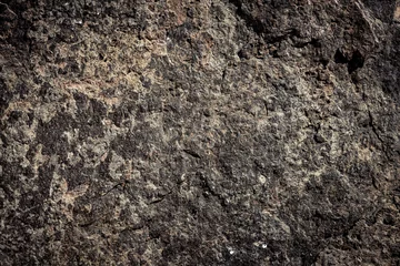 Papier Peint photo Pierres Fond de pierre, toile de fond de mur de roche avec une texture rugueuse. Surface abstraite, sale et texturée du matériau en pierre. Détail de la nature des rochers.