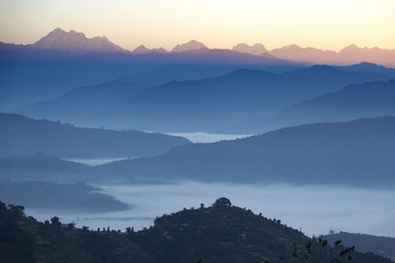 A view of the sun rising over the Himalayas from Dhulikhel, Nepal