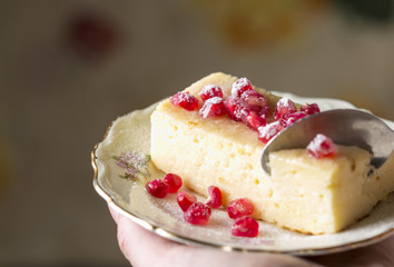  Eating cake with pomegranate seeds